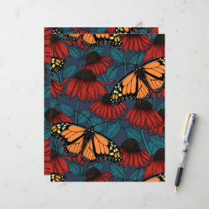 Papier Papillon monarque sur des fleurs rouges