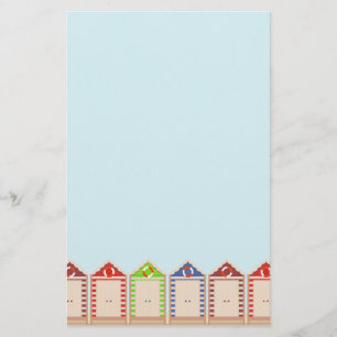 Papier Rangée de huttes de plage colorées
