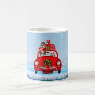 Papillon Dog in Auto mit dem Weihnachtsmann Kaffeetasse