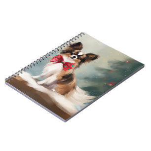 Papillon-Hund im Schnee Weihnachten Notizblock