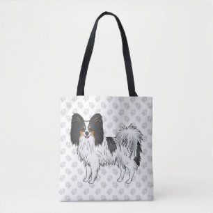 Papillon-Hund mit dreifarbigem Cartoon-Muster und  Tasche