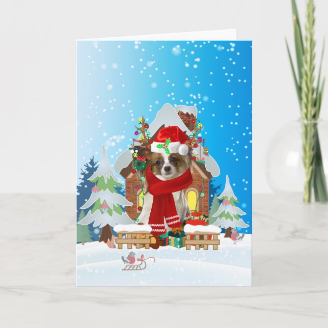  Papillon in snow with Christmas gifts  Karte (Vorderseite)