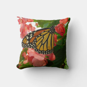 Papillon sur Coussin Fleurs rouges