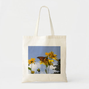 Papillon sur le Sac fourre-tout de tournesol