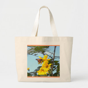 Papillon sur le Sac fourre-tout des tournesols