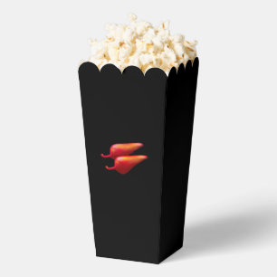 Paprikaschoten aus rotem Chili, schwarze Popcornbo Geschenkschachtel