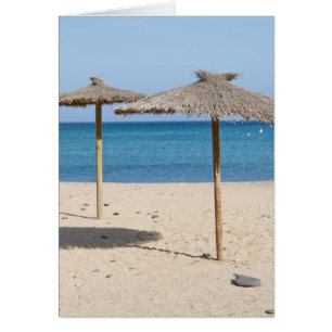 Parapluies de plage en toit de chaume