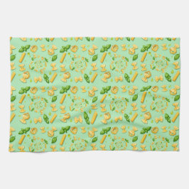 Pasta and basil leaves on green geschirrtuch