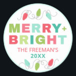 Pastel Christmas Lights Merry Bright Familienname Runder Aufkleber<br><div class="desc">Mit unseren Weihnachtsaufklebern "Merry Bright" den Feiertagsmagazin ausbreiten! Mit einem charmanten Design von pastellfarbenen Weihnachtslichtern und einer festlichen "Merry Bright"-Botschaft fügen diese Aufkleber Ihren Geschenken eine Touch von Laune und Personalisierung hinzu. Passen Sie den Aufkleber mit Ihrem Familiennamen und Jahr an, um eine einzigartige Touch zu erhalten, die die Empfänger...</div>