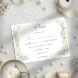 Pastel Wildflower Watercolor Floral Garden Wedding RSVP Karte<br><div class="desc">Embrace the charm of a romantic countryside celebration with this elegant watercolor wedding design that features a delicate floral wreath border in vintage Regency style, composed of whimsical wildflowers, including lavender sprigs, soft pink cosmos, and golden yellow daisies, all rendered in a sophisticated pastel palette. The clean, modern serif typography...</div>