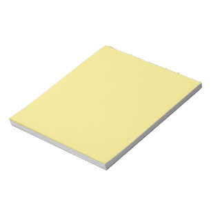 Pastellbutter, gelber Hintergrund bereit zur Anpas Notizblock
