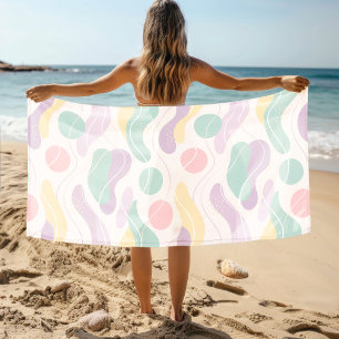 Pastellfarbene abstrakte nahtlose Musterwellen und Strandtuch