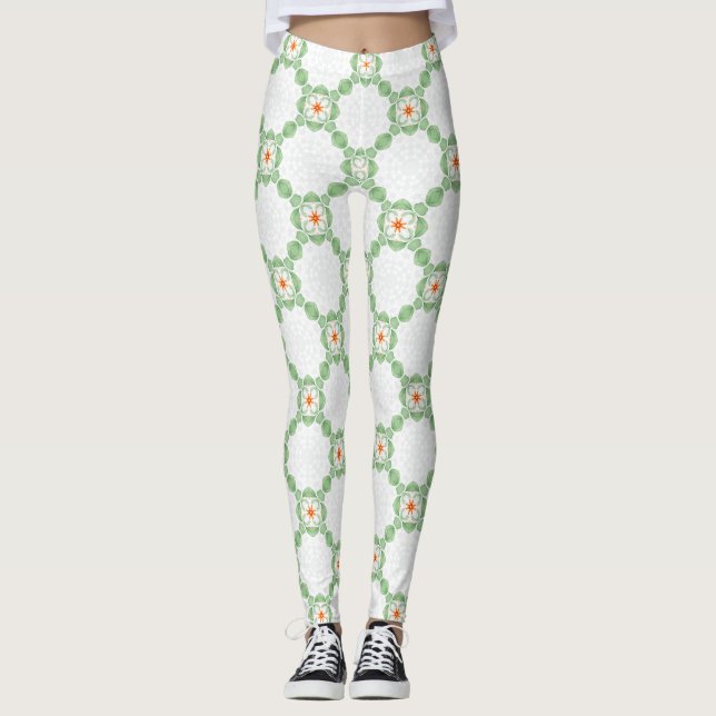 Pastellgrüne und orangefarbene Blumenblatt-Muster- Leggings (Vorderseite)