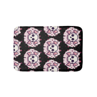 Pastellrosa Totenkopf und Kreuzknochen Badematte