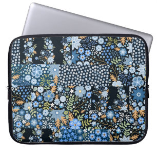 Patchwork Blaue Blumen: Nahtlose Stoffe. Laptopschutzhülle