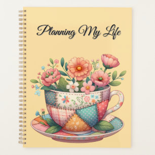 Patchwork-Teetasse mit wunderlichen Blumen Planer