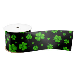 Pattern of green shamrocks on black background satinband