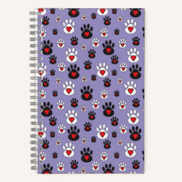 Pawprints mit roten Herzen auf blau Notizbuch