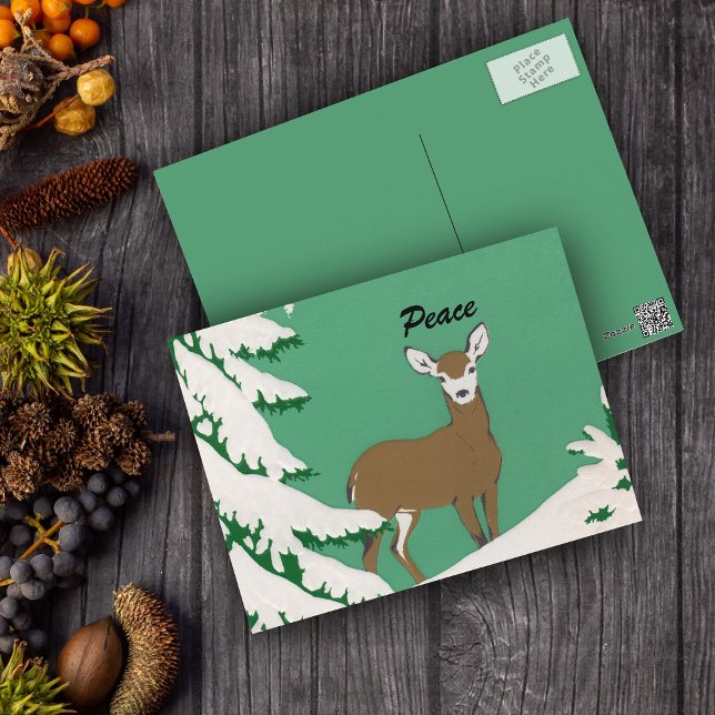 Peace Deer Snow Winter Szene Postkarte (Brown female deer white face in snow by pine tree on mint green postcard.)