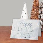 Peace Liebe and Joytypografy Watercolor Snow Feiertagskarte<br><div class="desc">Personalisierte Weihnachtskarten mit eleganter Typografie und schlichter Eleganz. Dieses Design hat eine Aquarellschnee Hintergrund mit Peace Liebe und Joy in handgeschriebenen Schriften und verzierte Aquarell,  verziert mit Wintergrün. Im Inneren ist die Vorlage Set für Sie,  um Ihre Nachricht hinzuzufügen. Auf der Rückseite ist ein passendes Design.</div>
