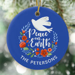 Peace on Earth Christmas Keramik Ornament<br><div class="desc">A pretty Christmas ornament featuring a dove in a floral wreath with the words Peace on Earth. The Christmas ornament is designed in royal blue,  red and white. An elegant holiday ornament for your Christmas tree. Personalize it with your name. Designed for you by Blackberry Boulevard.</div>