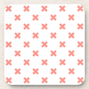 Peach cross stitches auf weiß getränkeuntersetzer