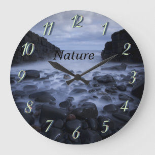 Pebbles and Rocks along the Ocean Shoreline Large Große Wanduhr