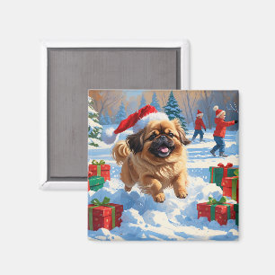 Pekingeser Hund läuft im Schnee mit Weihnachtsmütz Magnet