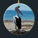 Pelican On Beach Rock, Keramikornament<br><div class="desc">Stehend auf einem Stein am Meer ist ein hungrig hübscher Pelikan, der für tasy-Fische-Muscheln gewartet ist.</div>