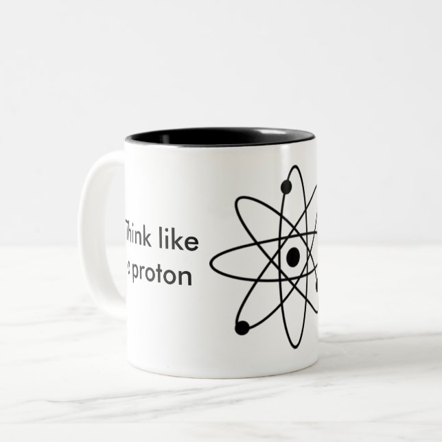 Pensez comme un proton et restez positif ! Tasse (Devant gauche)