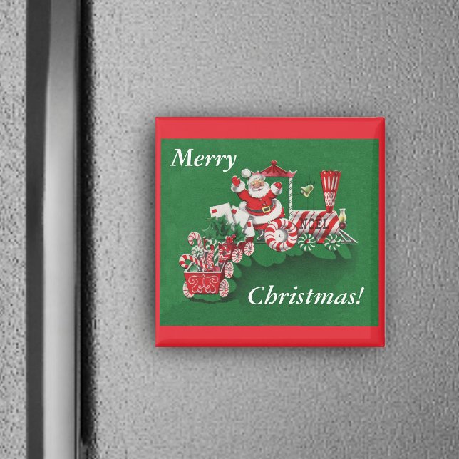 Père Noël Christmas Train Magnet (Santa on train peppermint candy wheels candy canes on red green Christmas square magnet.)