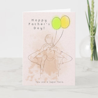Père tenant une carte de Fête des pères enfant 2