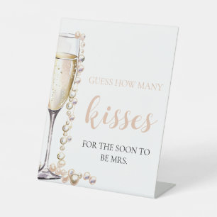 Perlen und Prosecco schätzen, wie viele Kisses Gam Sockelschild