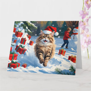 Perserkatze sitzt im Schnee mit Weihnachtsmütze Karte
