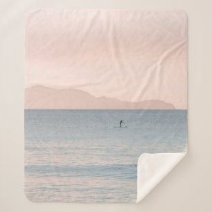 PERSON PADDLE BOARDING SHERPADECKE