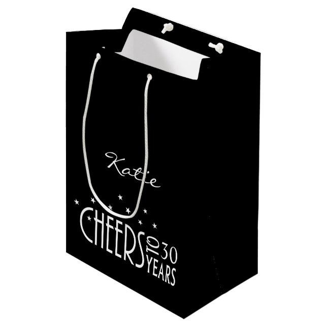 Personalisieren Sie die Papiergeschenktasche mit b Mittlere Geschenktüte (Vorderseite Schrägansicht)