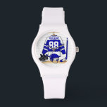 Personalisiert Ice Hockey Jersey Armbanduhr<br><div class="desc">Wir können dieses Design in jeder Farbkombination erstellen, kontaktieren Sie uns einfach über den Shop-Link. Personalisiertes Eishockey Jersey in blau weiß hängt in einem Umkleideraum mit Helm, Skaten und Hockey-Stick Kann voll personalisiert sein mit der Anzahl und dem Namen Ihrer Wahl, um ein tolles Geschenk für jeden Eishockey-Fan oder Spieler...</div>