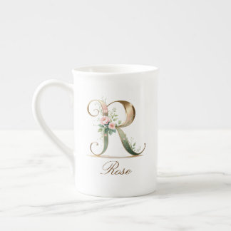 Personalisierte goldene Blumenmonogramm-Initiale R Prozellantasse