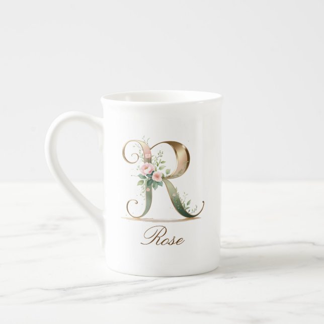 Personalisierte goldene Blumenmonogramm-Initiale R Prozellantasse (Links)