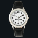 Personalisierte Kinderschau Armbanduhr<br><div class="desc">Dieses Bild zeigt eine Kinderuhr mit einem runden, silberfarbenen Gehäuse mit weißem Ziffernblatt. Die Uhr hat große, leicht zu lesende schwarze Zahlen von 1 bis 12, und die Stunden- und Minutenzeiger sind ebenfalls schwarz, mit den Worten "HOUR" und "MINUTE" beschriftet. Der Name auf der Armbanduhr kann auf jeden beliebigen Namen...</div>