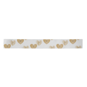 Personalisierte Monogramme, das Doppelte der golde Satinband