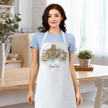 Personalisierte Weihnachtskekse Schürze<br><div class="desc">Diese festliche Schürze ist mit Weihnachtskeksen in Aquarellen und Blattwerk dekoriert. Einfach mit Ihrem Namen oder Monogramm anpassbar. Weil wir unsere Kunstwerke erstellen, werden Sie dieses exakte Bild von anderen Designern nicht finden. Original Wasserfarbe © Michele Davies.</div>
