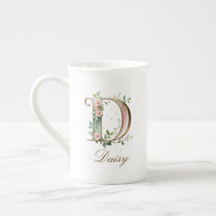 Personalisierter goldener Blumenmonogramm-Initiale Prozellantasse