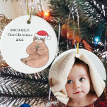 Personalisiertes Foto Baby's First Christmas Sloth Keramik Ornament<br><div class="desc">Dieser niedliche Weihnachtsschmuck ist mit einer Aquarellmatte mit einer Weihnachtsmannmütze geschmückt. Personalisieren Sie es mit dem Namen Ihres Babys und dem Jahr ihrer ersten Weihnachten. Ersetzen Sie das Foto durch das Foto Ihres Babys. Ändern Sie mithilfe des Entwurfstools die Textgröße, den Stil oder die Farbe. Weil wir unsere Kunstwerke erstellen,...</div>