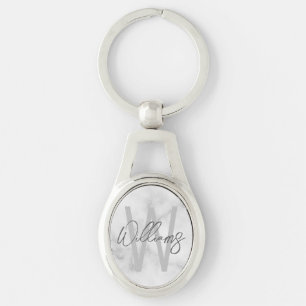 Personalisiertes Monogramm und Name für das weiße  Schlüsselanhänger