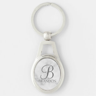 Personalisiertes Skriptmonogramm und Name marbiere Schlüsselanhänger