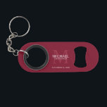 Personalized Groomsman's Monogram and Name Mini Flaschenöffner<br><div class="desc">Add a personal touch to your wedding with personalized groomsman's monogram and name gift. This design features personalized groomsman's name with title and wedding date in white and monogram in light burgundy red as background, in classic serif font style, on burgundy red background. Also perfect for best man, father of...</div>