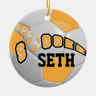 Personifizieren Sie Gold des Fußball-  Keramikornament