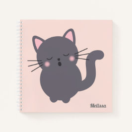 Persönliches Notizbuch mit schlafender grauer Katz