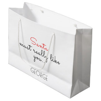 Personnalisez le sac cadeau de Noël avec le nom